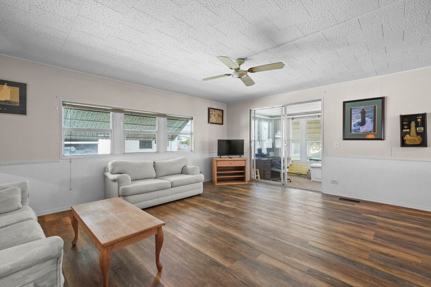 Calling all captains! If you're looking to keep your boat in the water without the high price tag, this move-in-ready, furnished home is for you. Located conveniently in the Manatee Pocket, this vibrant 55+ community, is just a short stroll from a deep-water marina offering dockage up to 42' for just $3.90/ft per month—putting you minutes from the ocean. This 2-bed, 2-bath home features a dual-carport and a dedicated storage/laundry room. Enjoy ultra-low condo fees that cover cable, water, sewer, and lawn care. Between the Boat Club, RV/trailer storage, and the active clubhouse and pool, you'll have everything you need to enjoy the coastal lifestyle on a fixed budget. No pets, just pure paradise!