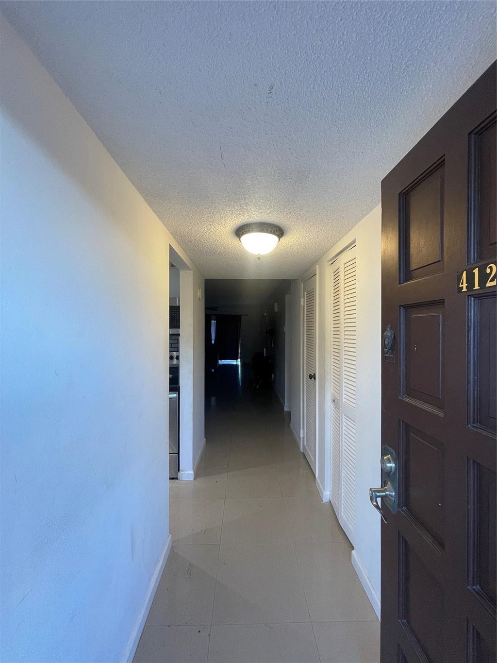 Photo of 6300 S Falls Circle Drive #412, Lauderhill, FL 33319 (MLS # B26077054)