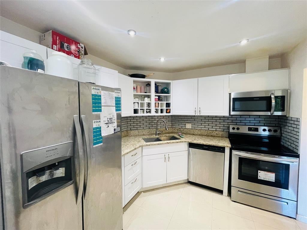 Photo of 6300 S Falls Circle Drive #412, Lauderhill, FL 33319 (MLS # B26077054)
