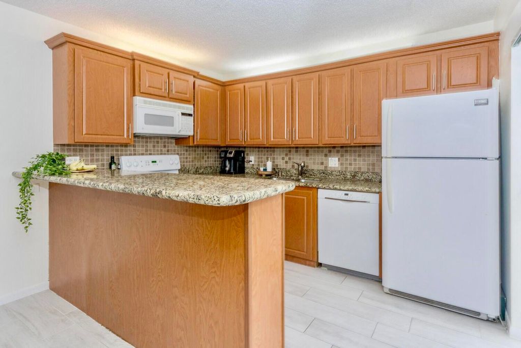 Photo of 1202 12th Terrace, Palm Beach Gardens, FL 33418 (MLS # R10942794)