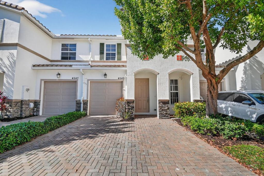 Photo of 4545 Tara Cove Way, West Palm Beach, FL 33417 (MLS # R11158813)