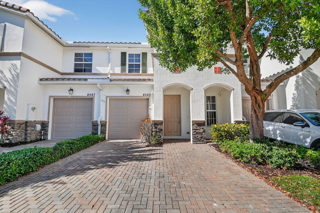 Photo of 4545 Tara Cove Way, West Palm Beach, FL 33417 (MLS # R11158813)