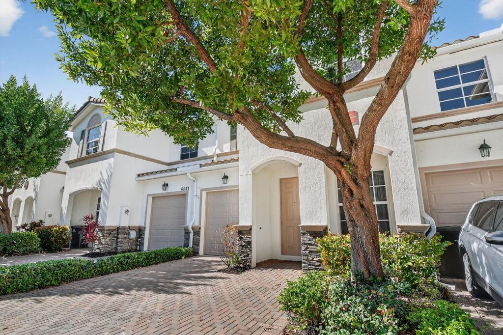 Photo of 4545 Tara Cove Way, West Palm Beach, FL 33417 (MLS # R11158813)