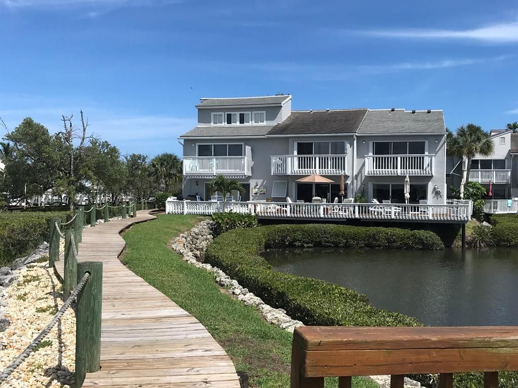Photo of 2490 Harbour Cove Drive, Hutchinson Island, FL 34949 (MLS # R10714829)