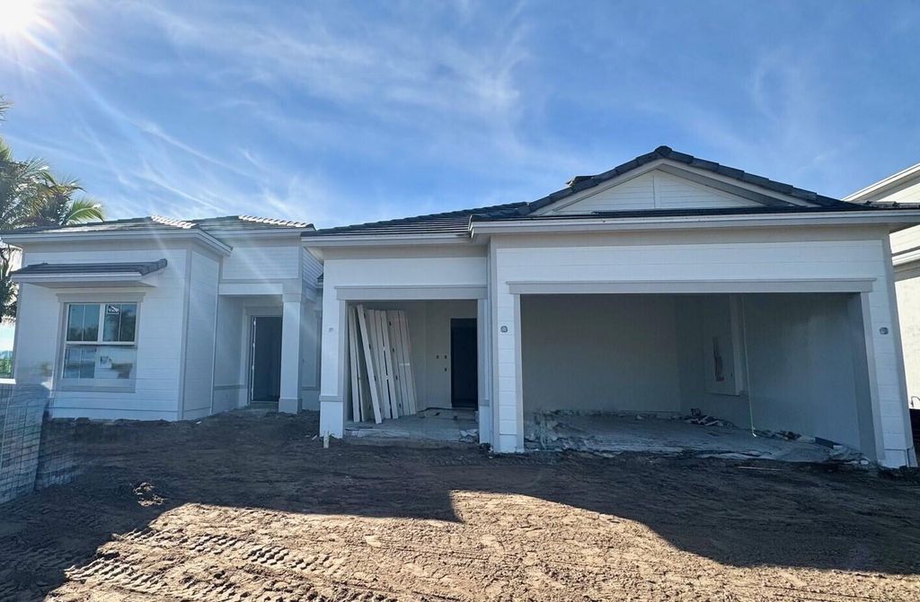 Photo of 10701 Stellar Circle #Stellar 55, Palm Beach Gardens, FL 33412 (MLS # R11143475)