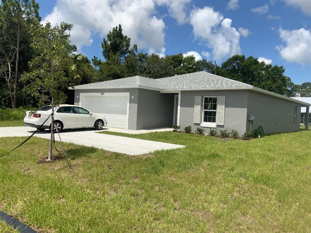 Photo of 1860 SW California Boulevard, Port St Lucie, FL 34953 (MLS # R10904454)
