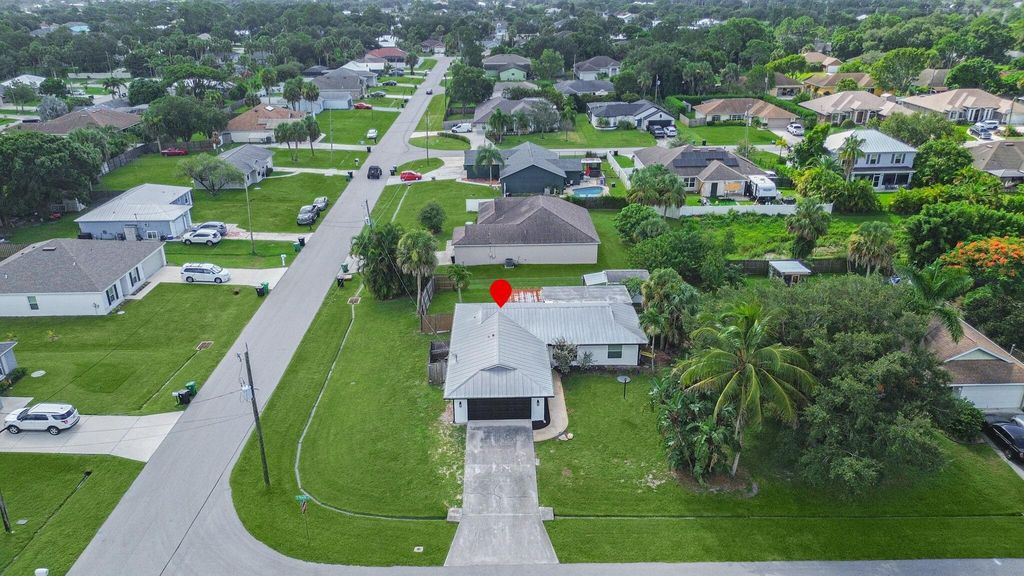 Photo of 2501 SW Beverly Street, Port Saint Lucie, FL 34953 (MLS # R11107845)