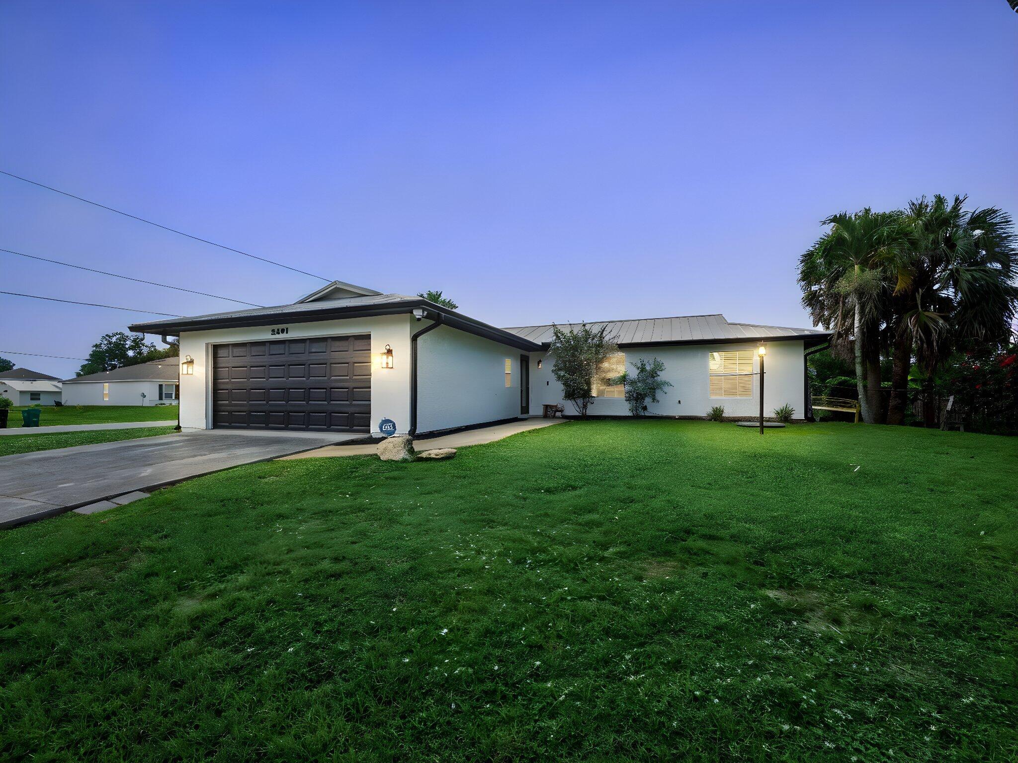 LOCATION, LOCATION, LOCATION! Enjoy the freedom of NON-HOA living in this charming 3-br, 2-ba + den home located on a huge corner lot, just 3 minutes from I-95 & 5 minutes from Tradition Center where you can enjoy events & many dining & shopping options. Step inside to find a freshly painted interior, vaulted ceilings & bright, open spaces along with custom built-in cabinetry featuring glass panels and interior lighting -- perfect for displaying your favorite decor. The exterior of the home shines with brand-new gutters, soffits & a fresh coat of paint. Enjoy the safety & energy efficiency of hurricane-rated storm windows and doors (with a 20-year warranty). Fenced back yard w/Pergola, shed, vegetable garden & room for pool.Minutes from Cleveland Clinic & 35 minutes to beach.