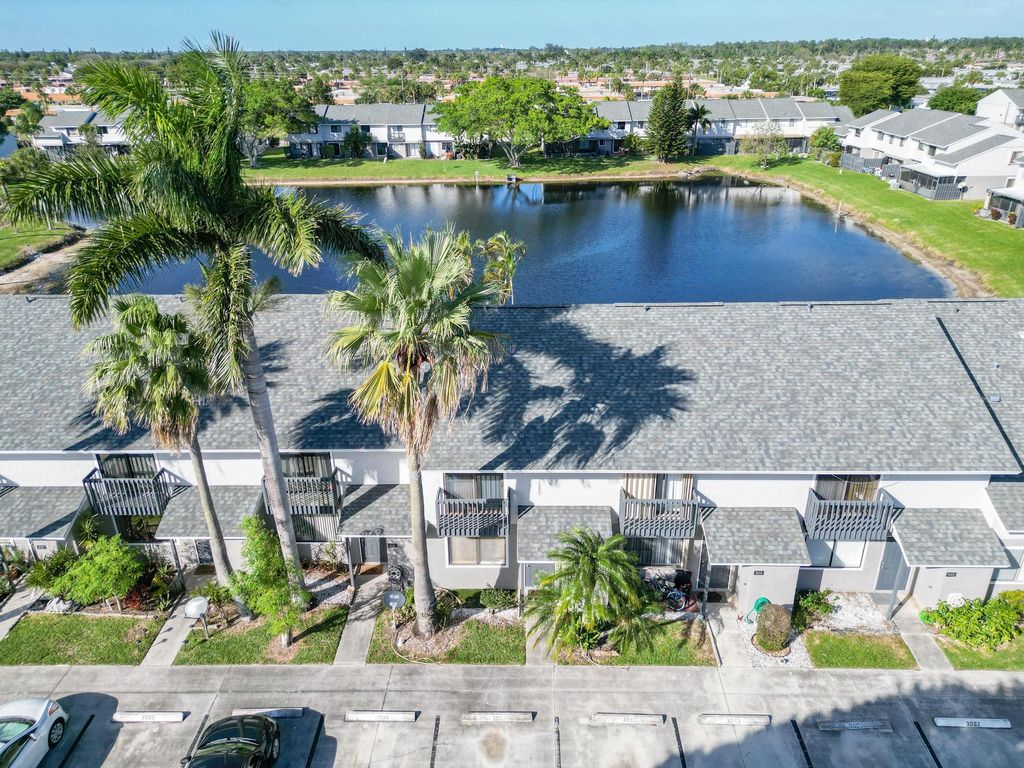 Photo of 3004 Poolside Drive, Greenacres, FL 33463 (MLS # R10958052)