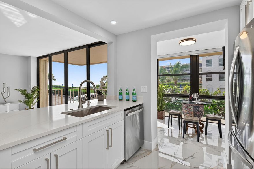 Experience the best of coastal living on Palm Beach Island in this 2BR/2BA 2nd-floor residence, fully renovated in 2025 and ideally located steps from the pristine beach. Flooded with natural light, this home features ceramic tile floors, quartz countertops, new kitchen and bath cabinetry, and all-new appliances. The desirable split bedroom floor plan offers privacy and comfort, while the spacious living area, breakfast nook, and private balcony invite you to enjoy sweeping ocean and Intracoastal views. The primary suite boasts a built-out closet and elegant bath. Additional highlights include impact windows and sliders, new AC, new power panel, one assigned parking spot in the covered garage, and a storage unit on the same floor. Onsite management. Designed for you--schedule a showing!