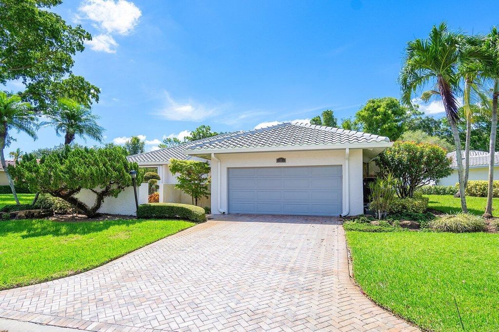 Photo of 51 Northwoods Lane, Boynton Beach, FL 33436 (MLS # R10997488)