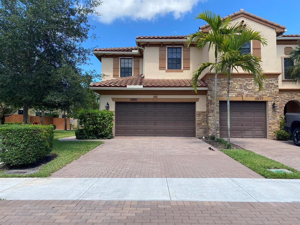 to apply https://apply.link/3ksrrC7. Fabulous waterfront 4 bed/3 ba townhouse with a 2 car garages. GATED COMMUNITY & built in 2015. 1 bedroom downstairs, great for guest or in-laws. And 3 bedrooms upstairs including the master bedroom. Great location, close to the community pool. Nice corner lot with a fabulous lakeview and beautiful upgrades. Stainless steel appliances, cherry wood cabinets, granite countertops and full tumbled marble backsplash. Tiles throughout the living area and neutral color carpet in bedrooms. Large laundry room. Enjoy sitting out on your covered patio overlooking the beautiful water view! Electronic gated community and has its very own community pool * Close to Wellingtons ''A'' rated schools, Trader Joe's, polo, etc.. NO PETS ALLOWE