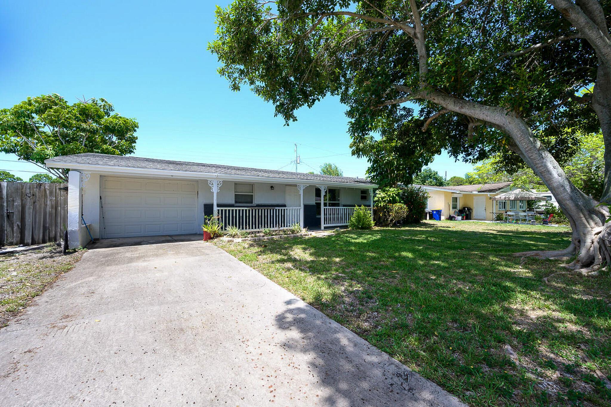 Welcome to this spacious 4-bed, 2-bath CBS home in the heart of Jensen Beach! Located in a non-HOA community within a top-rated school district, this 2,048 sq ft single-family home offers flexible living with an open floor plan, split bedrooms, and a 1-car garage. The generously sized, fenced backyard provides ample space for outdoor enjoyment--and with no HOA, you're free to park your trucks, boats, or trailers right at home. Pet-friendly and perfectly positioned near downtown Jensen Beach, the Causeway, beautiful beaches, parks, shopping, and dining. This home is ideal as a primary residence, second home, or investment property. You will love the white coastal kitchen and baths, large master bedroom, and LVP flooring
