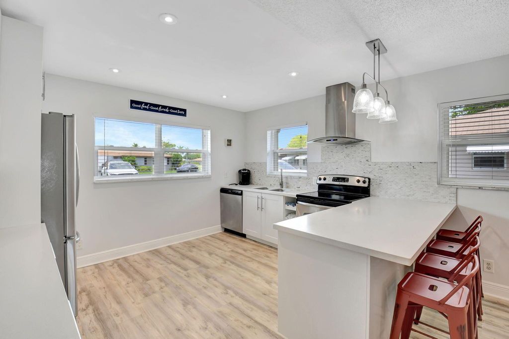 Photo of 124 Mockingbird Lane #124, Delray Beach, FL 33445 (MLS # R11088389)