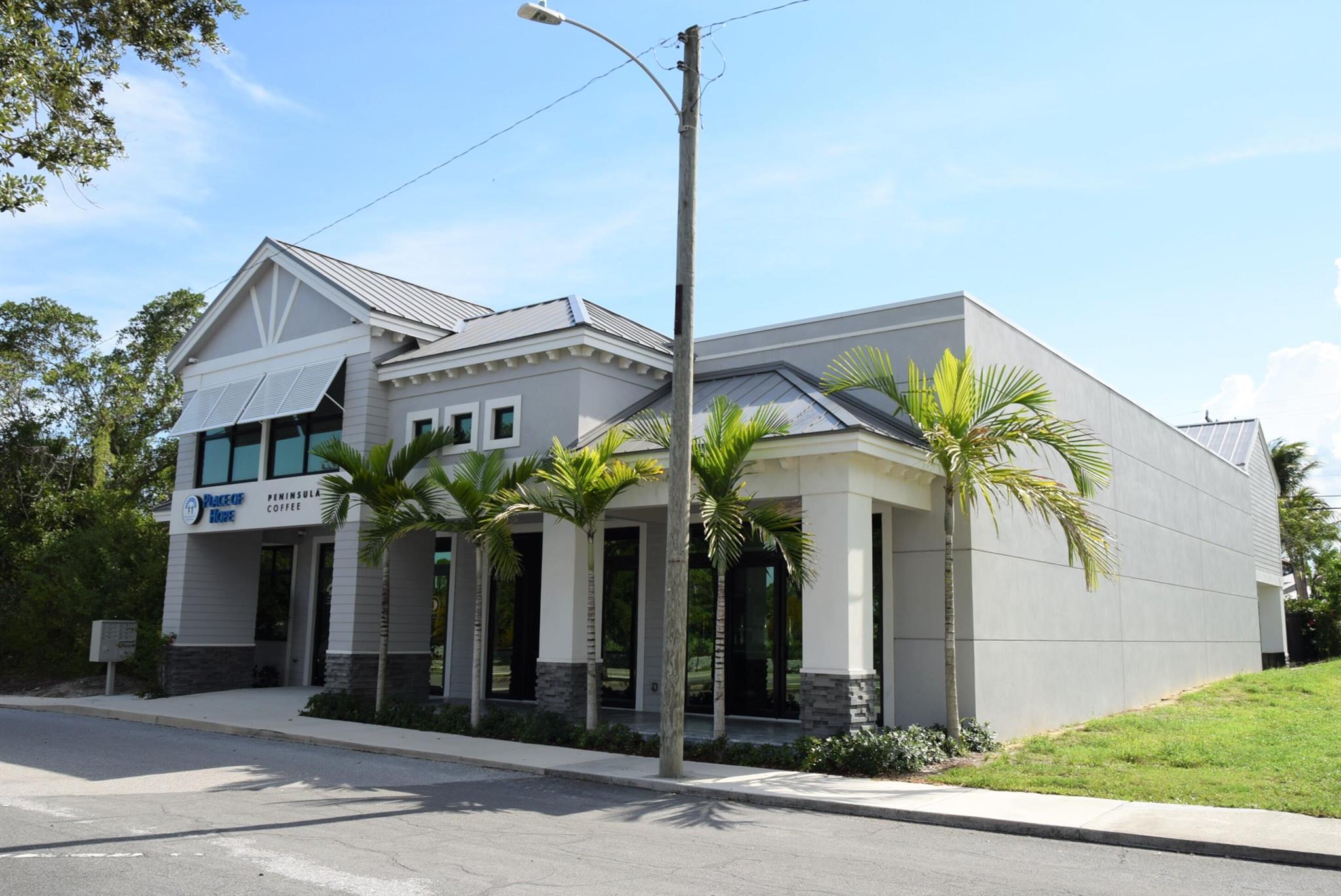 Two-story 5,915+/- SF mixed-use building divided into three areas. The building includes a 1,305+/- SF fully equipped, high-end coffee shop with a grease trap, 2,895+/- SF of office space with a community room/conference room, plus 1,050+/- SF on the second floor which consists of two residential units. A large, expansive, covered patio space provides a tranquil atmosphere with plenty of room for outdoor seating. This property is ideal for a high-end family office/foundation or investor. The sale does not include any furniture. The property is on city water and sewer.