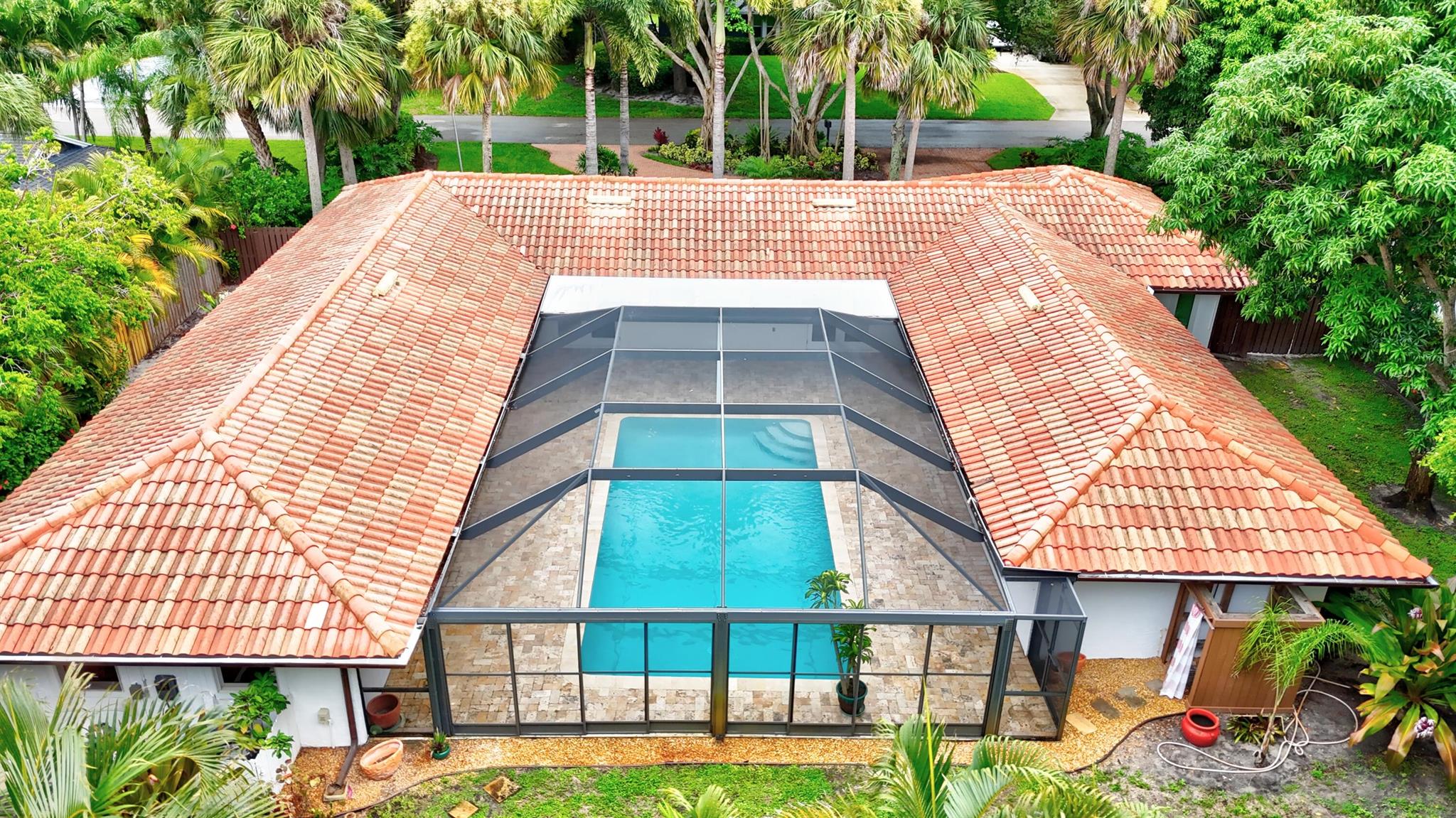Step into timeless elegance in this impeccably renovated 3-bedroom, 2.5-bath courtyard-style home in prestigious South Sewall's Point. Designed for luxury and comfort, it features custom tile throughout and French doors that open to a private saltwater pool, seamlessly blending indoor and outdoor living. Every detail is thoughtfully curated--from the chef's kitchen to the elegant laundry suite with a custom dog wash station. A spacious circular driveway and two-car garage offer both convenience and curb appeal. Located just minutes from Hutchinson Island's beaches, downtown Stuart, and Jensen Beach, this highly sought-after town and neighborhood is known for its natural beauty, scenic parks, and top-rated schools. Walk to the nearby waterfront park or enjoy fine dining and boutique shops.