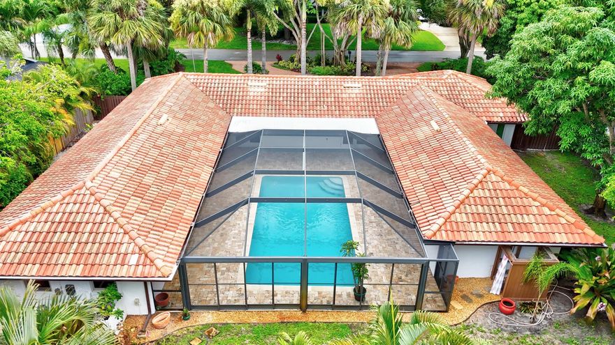 Step into timeless elegance in this impeccably renovated 3bed +bonus room, 2.5-bath courtyard-style home in prestigious South Sewall's Point. Designed for luxury and comfort, it features custom tile floors and French doors that open to a private saltwater pool, seamlessly blending indoor and outdoor living. Every detail is thoughtfully curated--from the chef's kitchen to the elegant laundry suite with a custom dog wash station. A spacious circular driveway and two-car garage offer both convenience and curb appeal. Located just minutes from Hutchinson Island's beaches, downtown Stuart, and Jensen Beach, this highly sought-after town and neighborhood is known for its natural beauty, scenic parks, and top-rated schools. Walk to the nearby waterfront park or enjoy fine dining and boutique shop