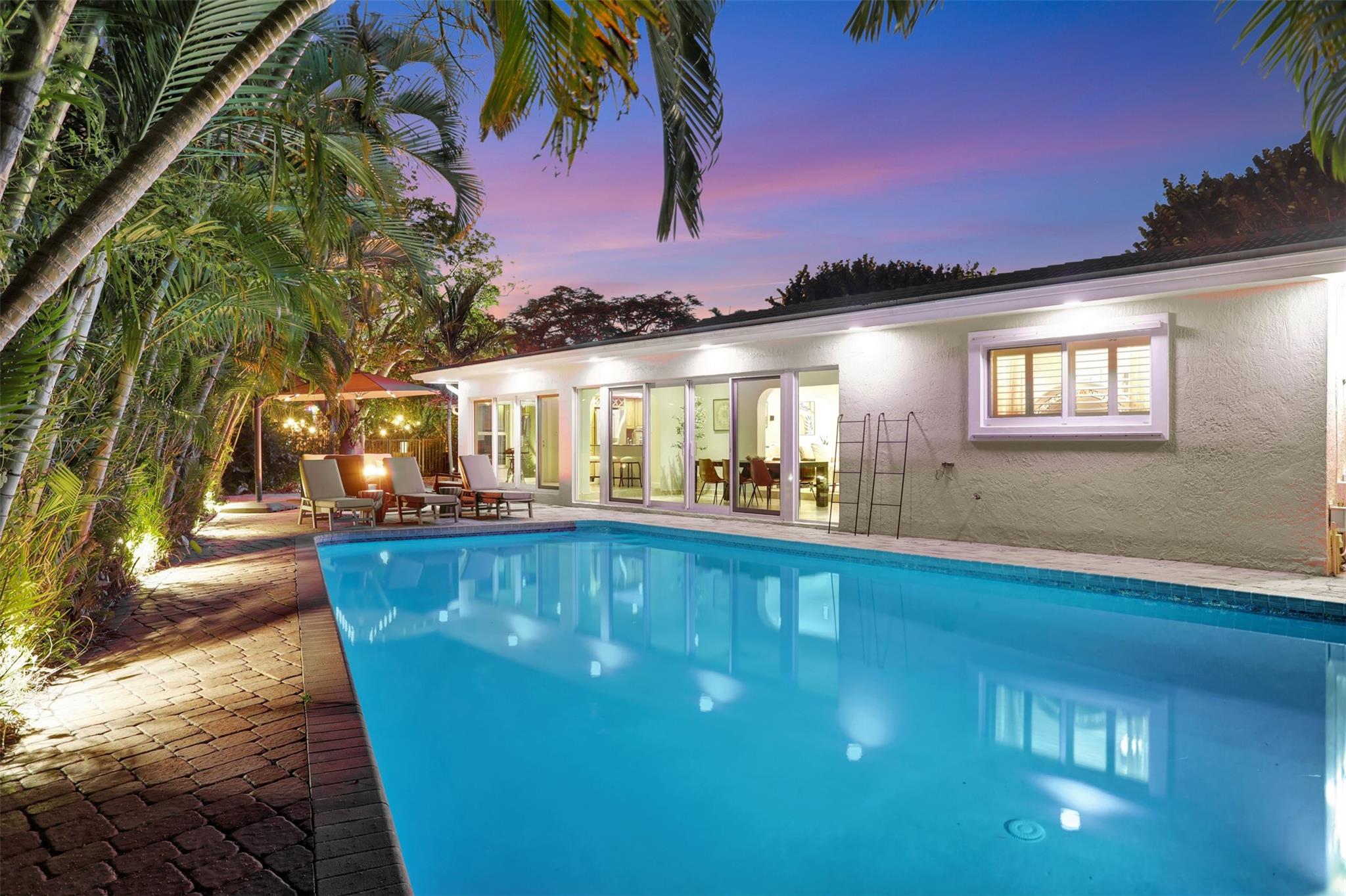 Fully Appointed monthly Vacation Home in The Hillsboro Shores Beach neighborhood. Stunning home with 4 bedrooms/4 bathrooms, heated salt water pool, fenced back yard, play area, pool views & stocked with everything that you need for a stress free monthly rental. Minutes walk to the private beach access. Pompano has a lot to offer with amazing beaches, fishing pier, restaurants and shops and close to FLL international airport. Can accommodate a family up to 8 comfortably with 5 beds and plenty of space to spread out. Plenty of parking, outside seating, fire pit and BBQ. A true tropical paradise.. Seasonal prices subject to change.