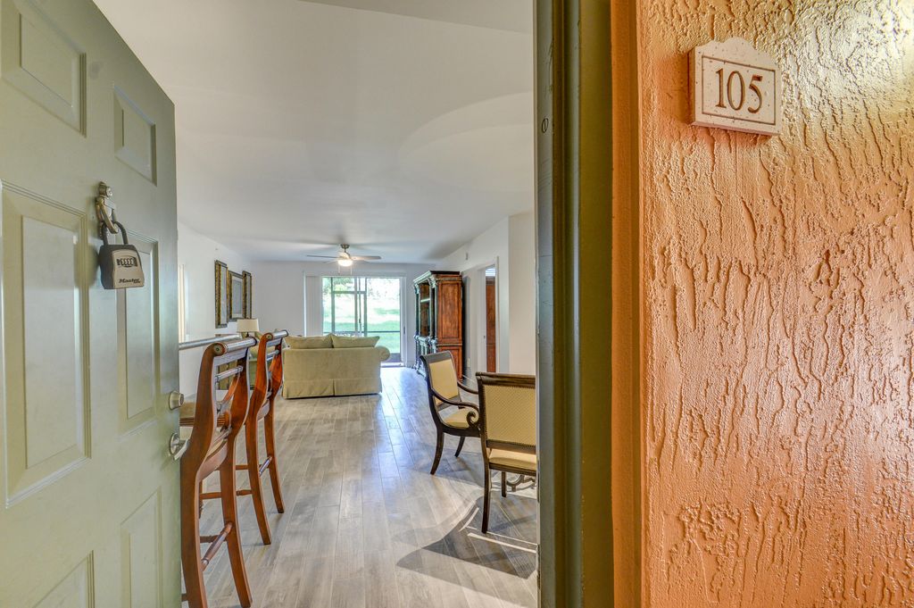 Photo of 11770 St Andrews Place #105, Wellington, FL 33414 (MLS # B26023340)