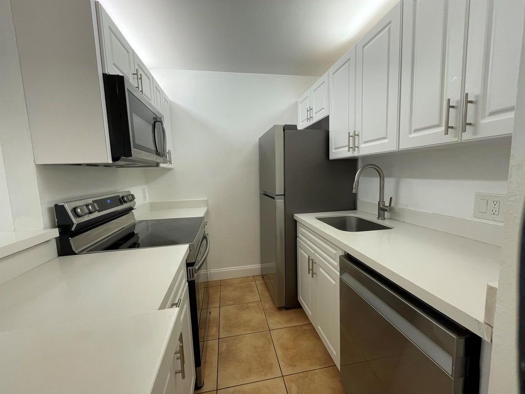 Photo of 31 Crossings Circle #A, Boynton Beach, FL 33435 (MLS # R11065326)