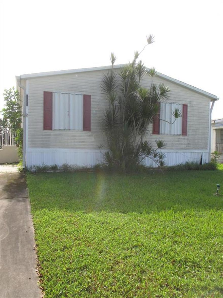 YOU OWN THE LAND! Priced to sell quickly! This home offers 3 spacious bedrooms and 2 large bathrooms! Nice flooring throughout the home and spacious/open kitchen leading to the dining area. Large slab on the back to enjoy your mornings and afternoons! No rear neighbors! Driveway fits many cars. HOA includes lawn care and management of the community. Located in Boca with very low HOA dues and pets are allowed! Call Today!