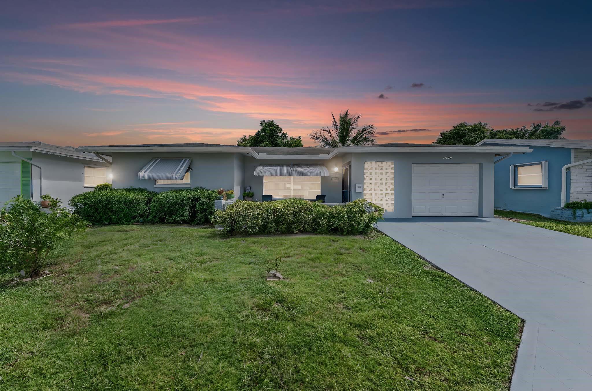 Mainlands in Tamarac 55+ Community is a lovely place to live. Has 2 Community Pools, Clubhouse, Several Amenities and the Association cares for the Sprinklers and Lawn Maintenance. This home Features 2BR and 2BA and the Exceedingly Large Florida Room. Larger model home with 1669sf Under Air and 1707sf Adjusted area. Updated Kitchen has SSL Granite and Glass Tile Backsplash. Both Bathrooms are Beautifully Updated, both have been retiled, Primary has Walk-In Shower. Primary Bedroom has new tile floors. There are New Ceiling Fans and light fixtures though the home. Brand New AC 2025, Roof 2013. Hurricane Grade Entry Door, Side doors and Garage Door, Storm Shutters on all the windows.