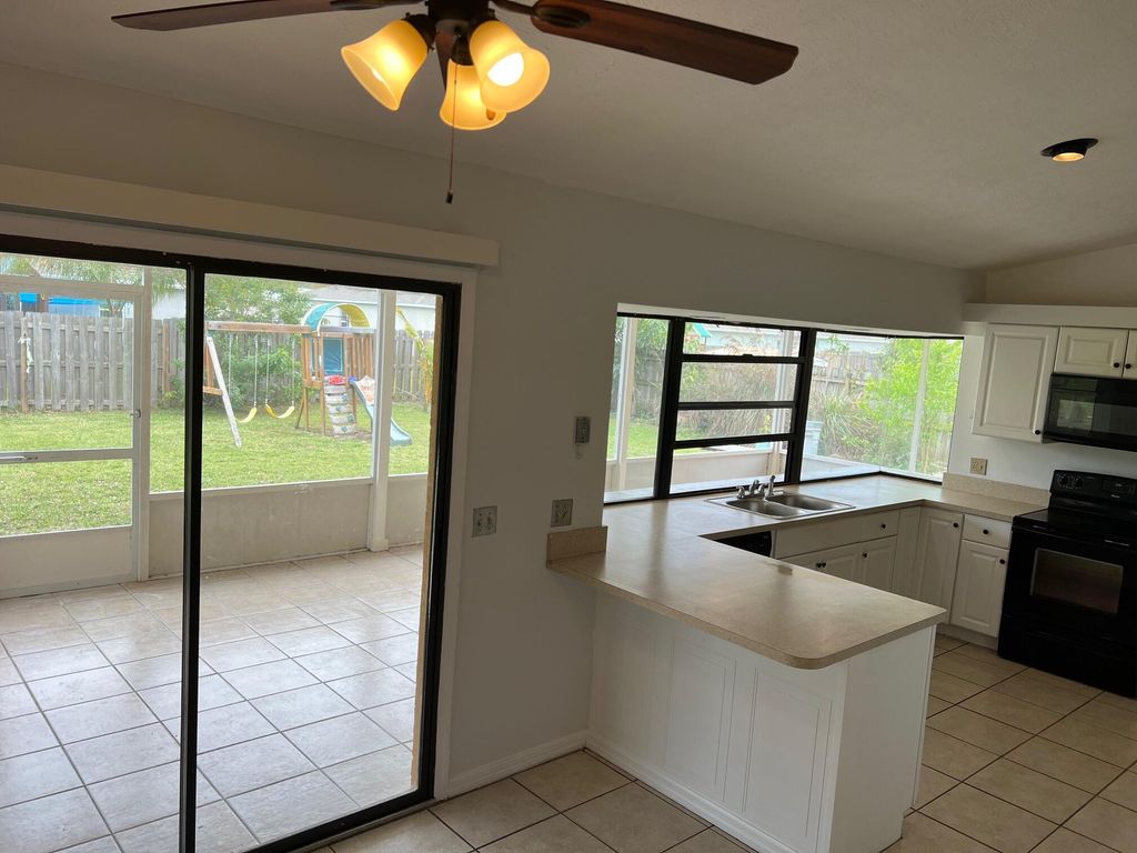 Photo of 1317 SE Floresta Drive, Port Saint Lucie, FL 34983 (MLS # R10991974)