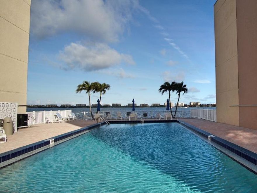 MOTIVATED SELLER, BRING ALL OFFERS!! ENJOY LIFE ON THE INTRACOASTAL WATERWAY. THIS 55+, 2ND FLOOR UNIT IS LIGHT AND BRIGHT WITH VIEWS OF THE WATER FROM THE COVERED SCREENED BALCONY AND LIVING ROOM. BOTH BATHROOMS HAVE BEEN UPDATED FROM THE WALLBOARDS IN INCLUDING A LUXURIOUS JACUZZI TUB. FRENCH DOOR IN LIVING ROOM AND SLIDERS IN BEDROOM LEAD TO THE BALCONY. NEWER EQUIPMENT: A/C (2015), WATER HEATER (2017), DISHWASHER (2017), ELECTRICAL PANEL (2015). INCLUDES ONE PARKING SPACE PLUS GUEST PARKING. AMENITIES INCLUDE HEATED POOL OVERLOOKING INTRACOASTAL, CLUBHOUSE CARD ROOM WITH POOL TABLE AND KITCHEN,BICYCLE STORAGE, STORAGE ROOM, LAUNDRY ROOMS ALL SECURE WITH KEY ACCESS AND FRONT ENTRY PHONE. CLOSE TO DOWNTOWN AREAS, DINING AND SHOPPING.