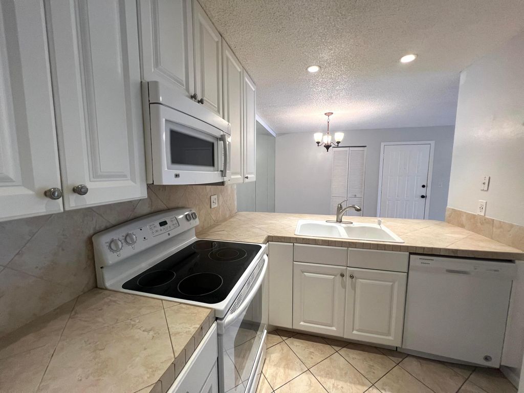 Photo of 3402 Gardens East Drive #18b, Palm Beach Gardens, FL 33410 (MLS # R11155005)