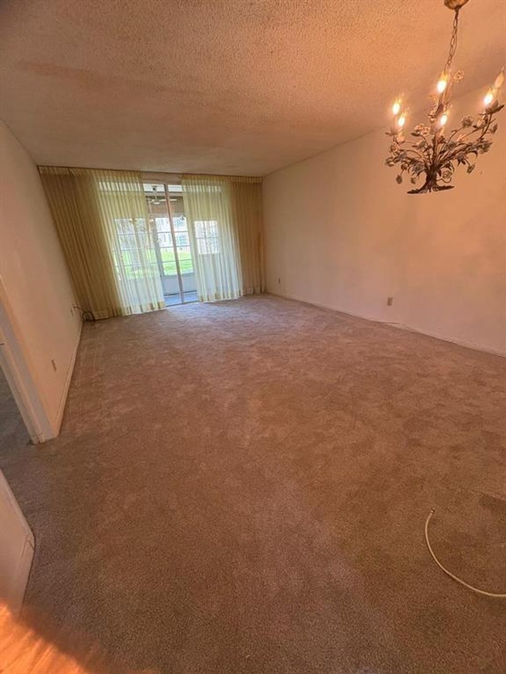 Photo of 6001 NW 61st Ave #105, Tamarac, FL 33319 (MLS # F10540039)