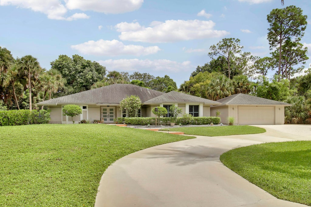 Photo of 8552 Thousand Pines Circle, West Palm Beach, FL 33411 (MLS # B26076838)