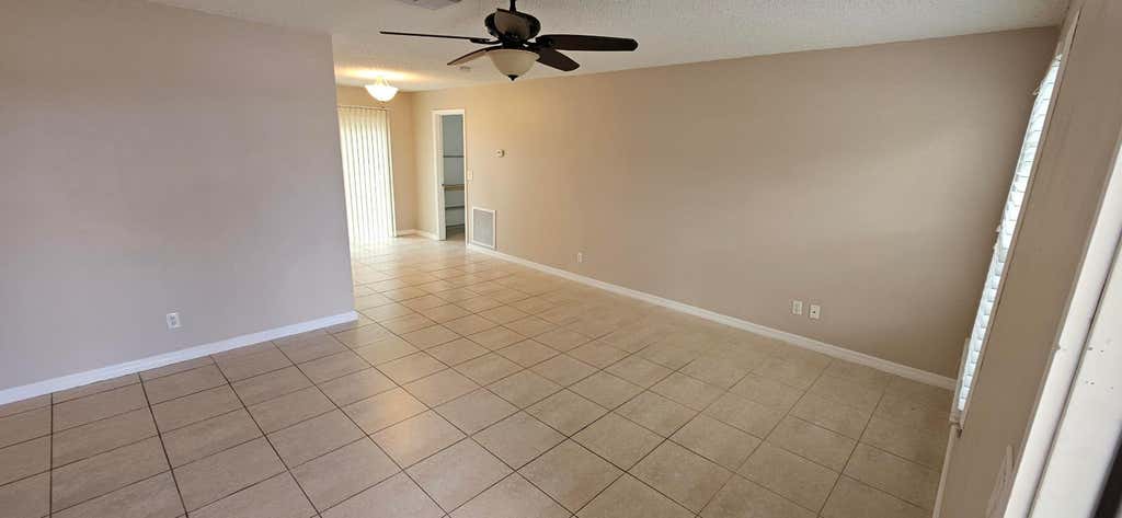 Photo of 1729 SW Taurus Lane, Port Saint Lucie, FL 34984 (MLS # R10962618)