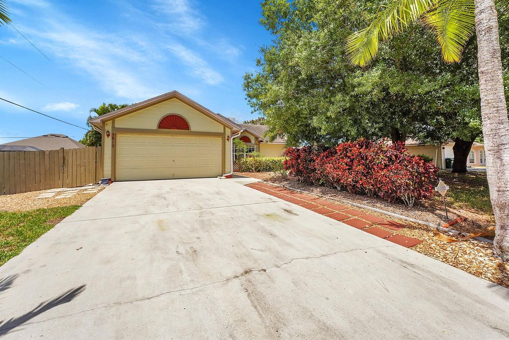 Photo of 3812 SW Ramspeck Street, Port Saint Lucie, FL 34953 (MLS # R10983002)