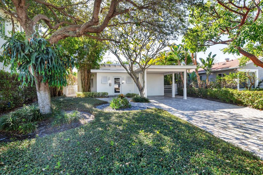 Mid-century modern style in the heart of SoSo! Welcome to 248 Cortez Road, an updated and stylish home with a lovely pool that is east of Olive in the Southend of West Palm Beach on a through-street to Flagler Drive and the Intracoastal Waterway. You enter the home into a gorgeous open living room with soaring ceilings with exposed wood beams. Natural light floods the room, and details include the original hardwood floors, French Doors and a floor plan that is perfect for entertaining.248 Cortez boasts a seamless indoor / outdoor flow to the pool area, PGT hurricane impact windows and doors, a two-zone air conditioning system (installed 2021), and upgraded dimmable lighting to create the perfect ambiance.