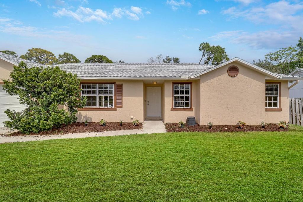 Photo of 769 SW Hogan Street, Port Saint Lucie, FL 34983 (MLS # R10988746)