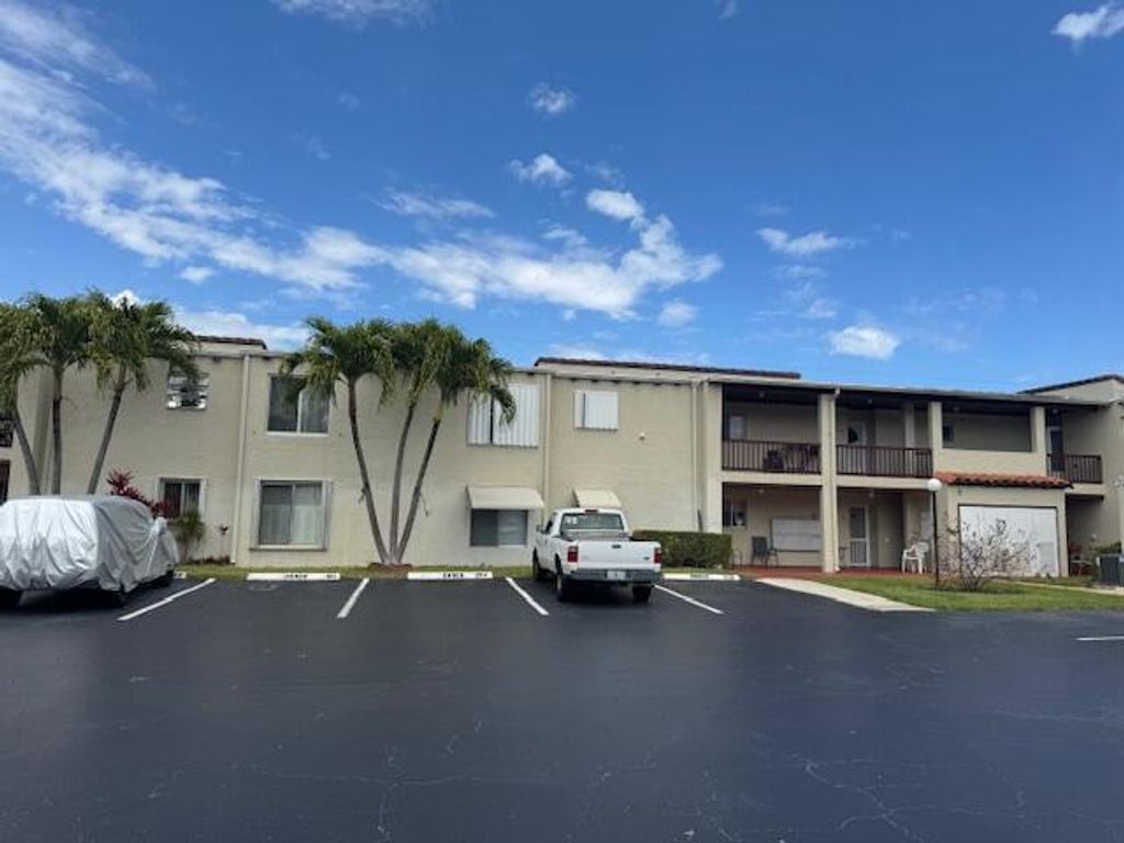 Photo of 2601 Boundbrook Boulevard #104, Palm Springs, FL 33406 (MLS # R11154650)