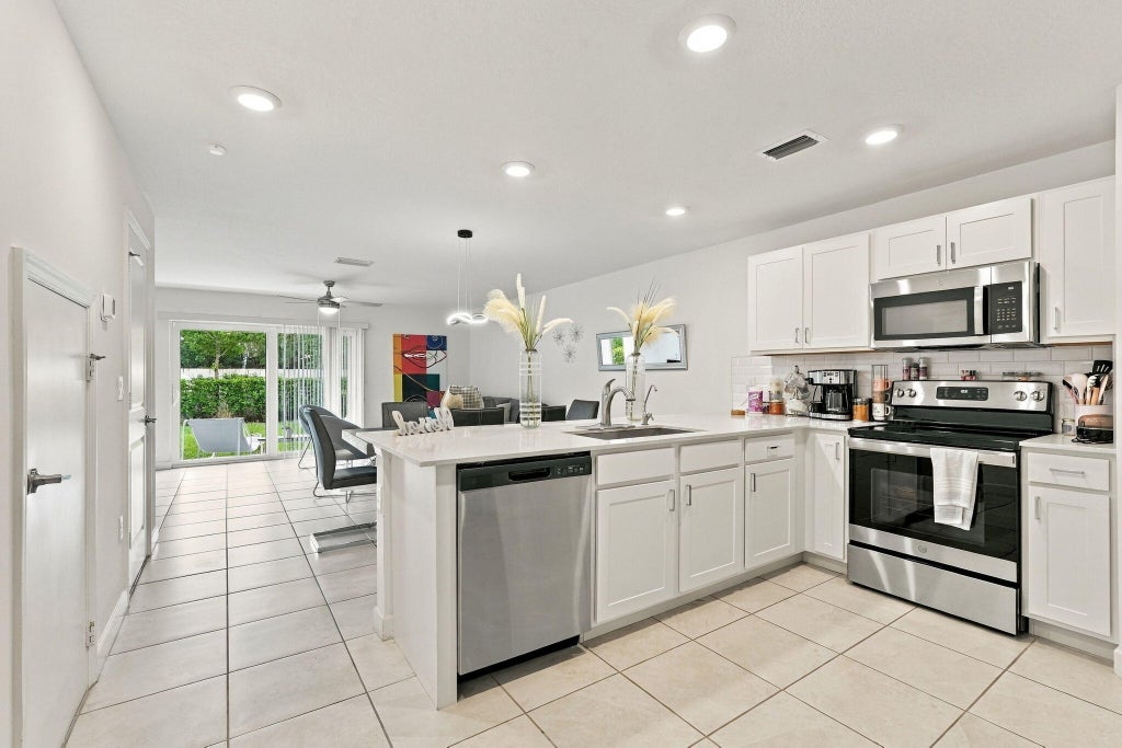 Photo of 4194 BENT RIVER Road, Lake Worth, FL 33467 (MLS # B26088467)
