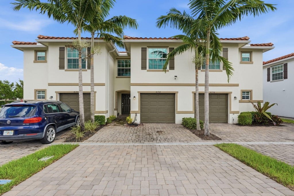 Photo of 4194 BENT RIVER Road, Lake Worth, FL 33467 (MLS # B26088467)