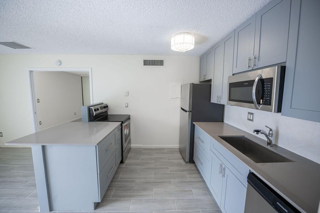 Photo of 641 Executive Center Drive #P203, West Palm Beach, FL 33401 (MLS # R10939702)