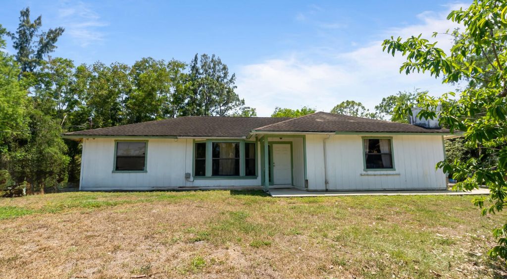Photo of 17254 32nd Lane N, The Acreage, FL 33470 (MLS # B26015706)