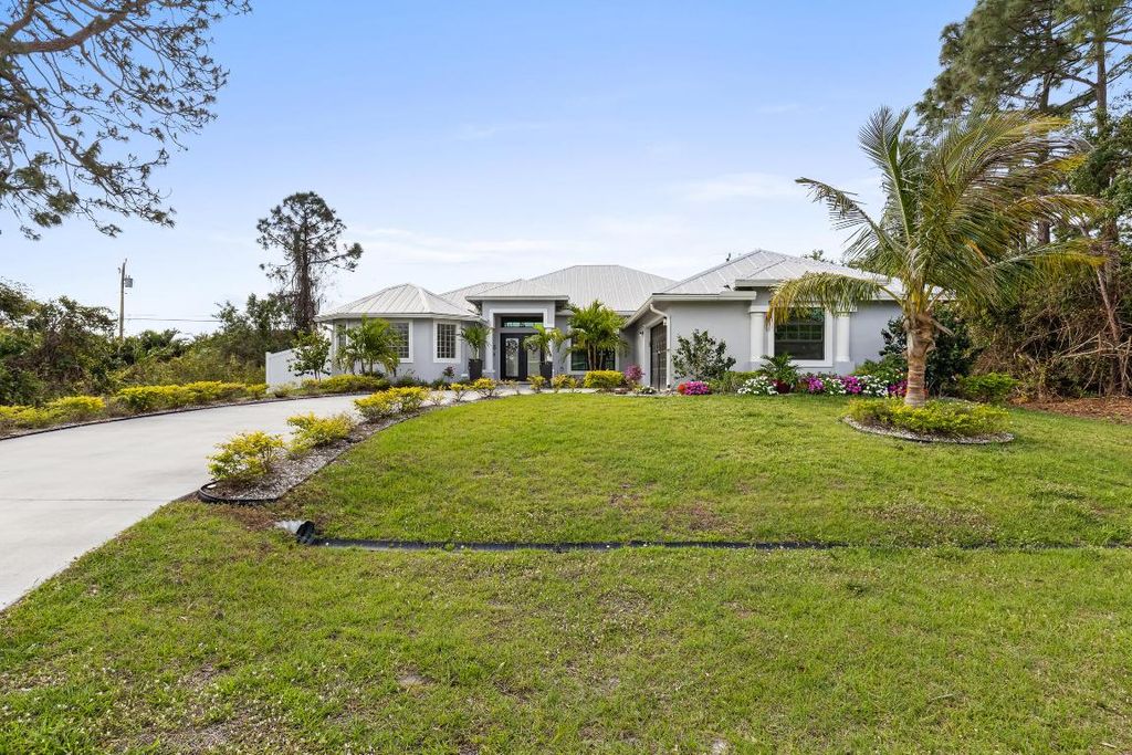 Photo of 1434 SW Jacksonville Avenue, Port Saint Lucie, FL 34953 (MLS # R11153769)