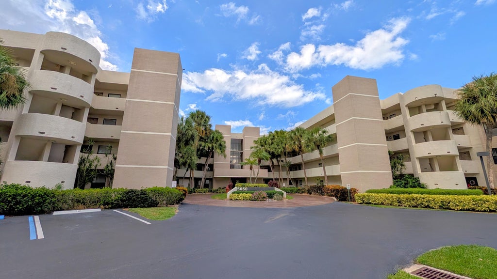 Photo of 5650 Camino Del Sol #101, Boca Raton, FL 33433 (MLS # B26081086)
