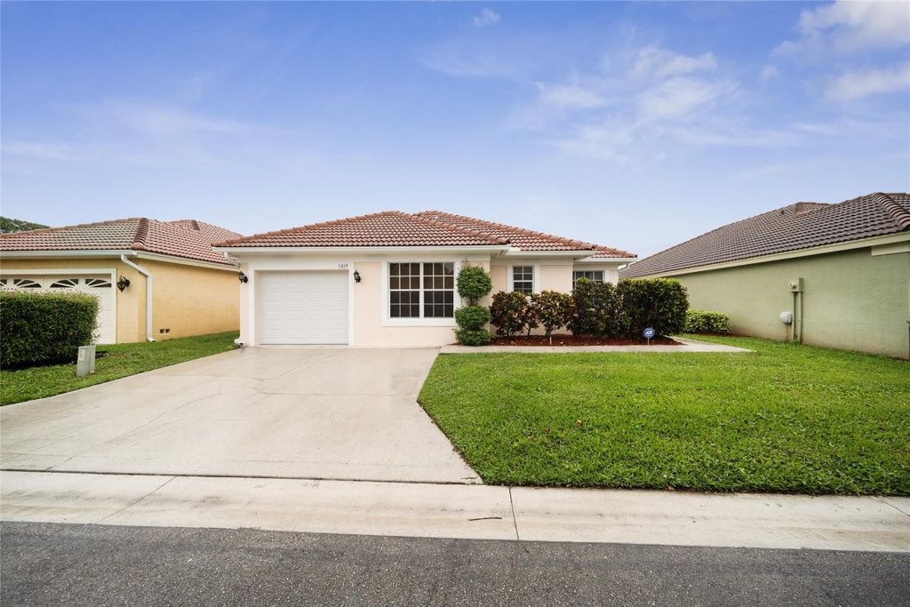 Photo of 1019 Aspri Way, Riviera Beach, FL 33418 (MLS # F10429699)
