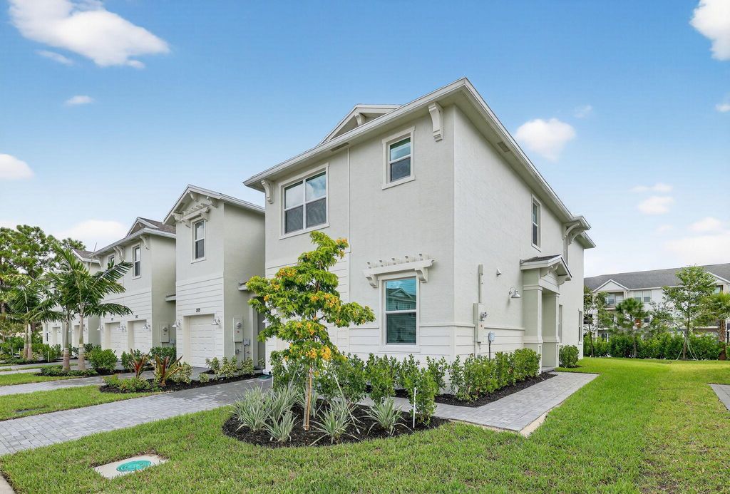 Photo of 311 SE Crossoak Lane, Port St Lucie, FL 34984 (MLS # R11123578)