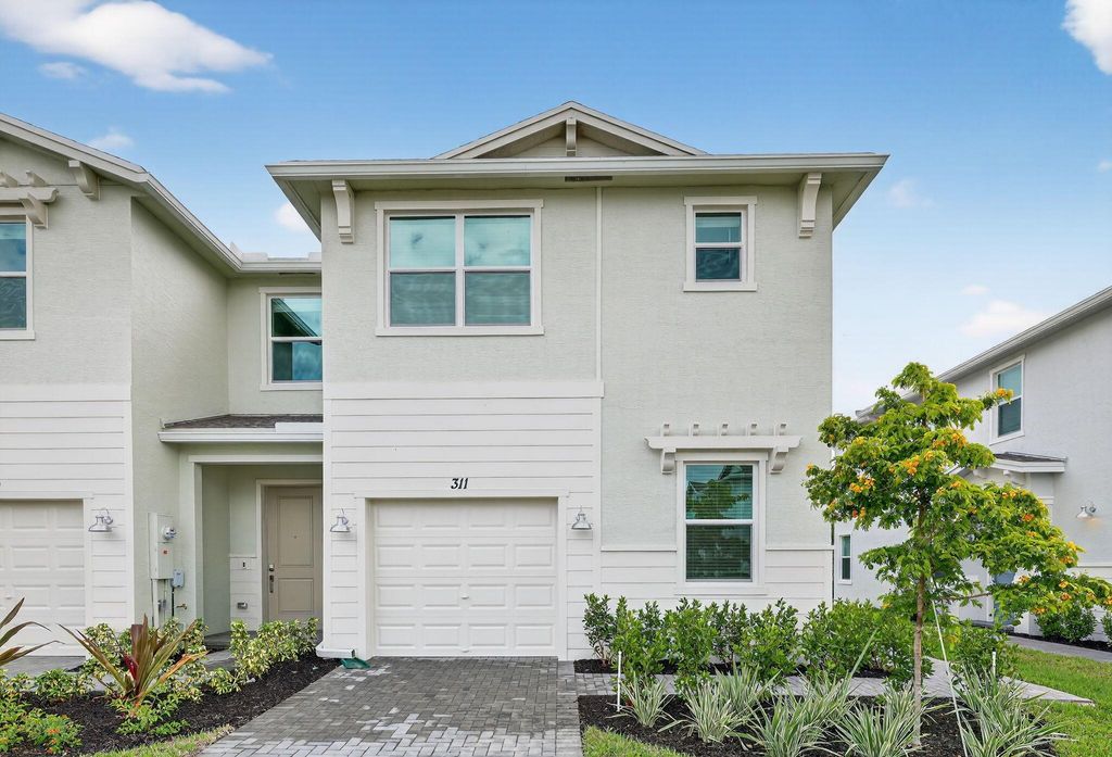 Photo of 311 SE Crossoak Lane, Port St Lucie, FL 34984 (MLS # R11123578)