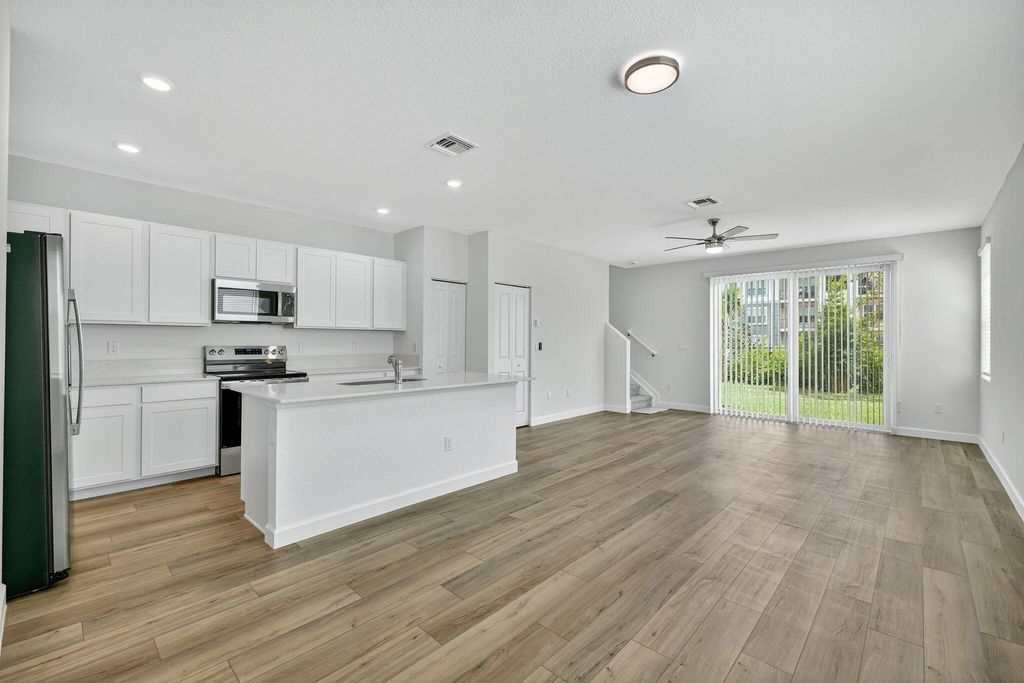 Photo of 311 SE Crossoak Lane, Port St Lucie, FL 34984 (MLS # R11123578)