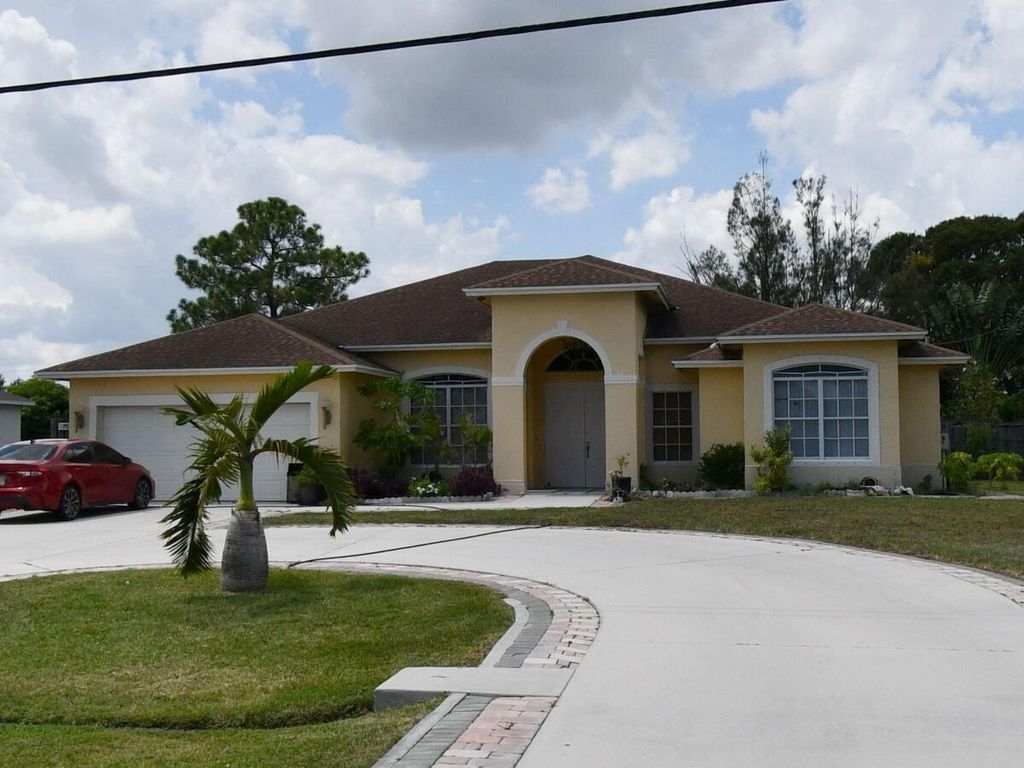 Photo of 368 NW Bayshore Boulevard, Port Saint Lucie, FL 34983 (MLS # R11075179)