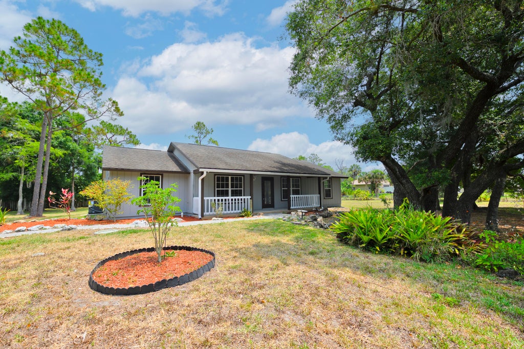 Photo of 16721 Tangerine Boulevard, The Acreage, FL 33470 (MLS # R10989302)