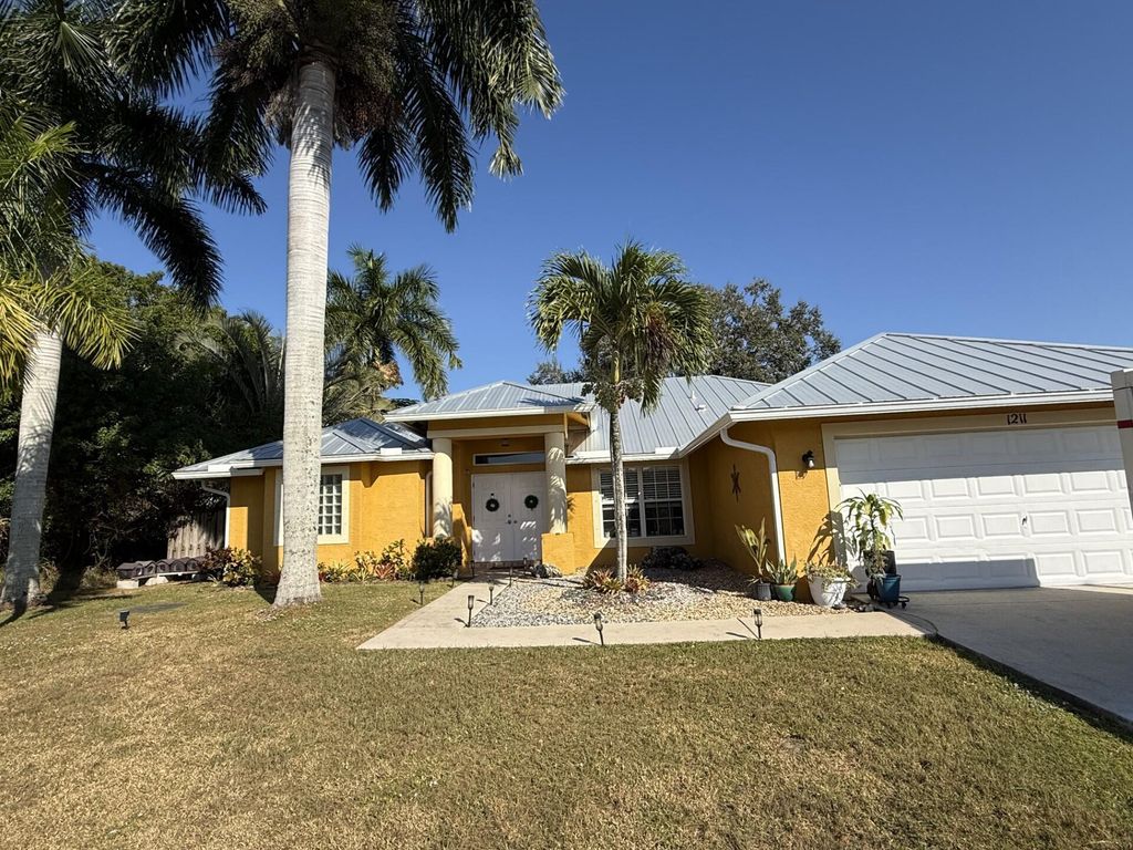 Photo of 1211 SW Dalton Avenue, Port Saint Lucie, FL 34953 (MLS # R11141654)