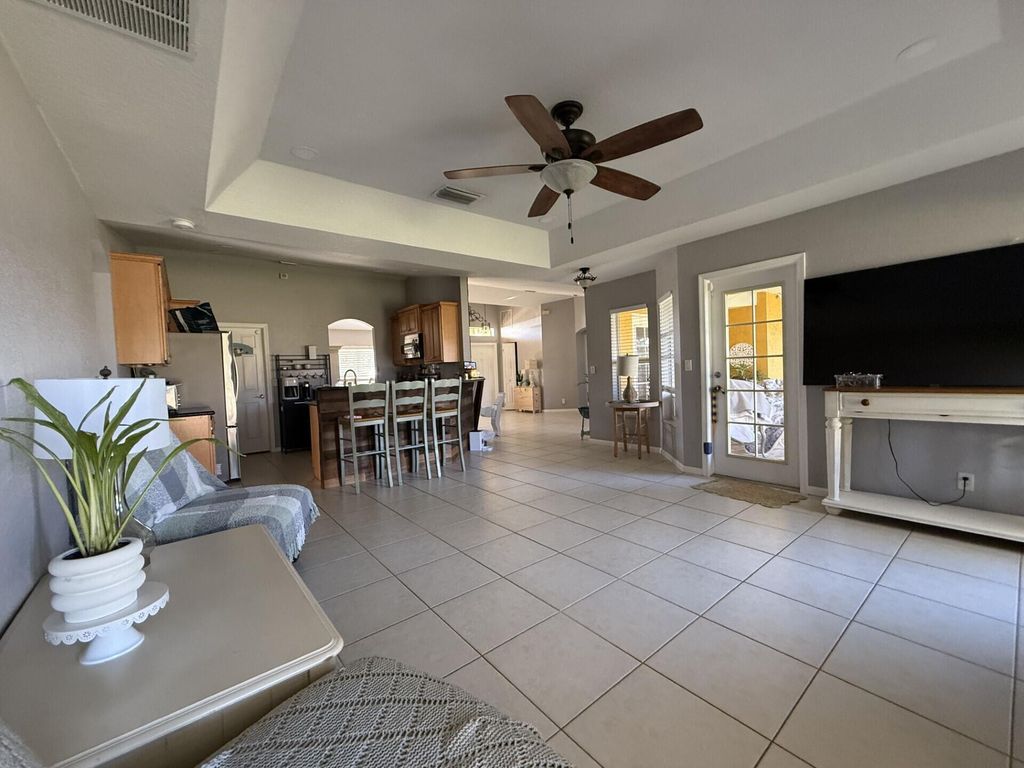 Photo of 1211 SW Dalton Avenue, Port Saint Lucie, FL 34953 (MLS # R11141654)